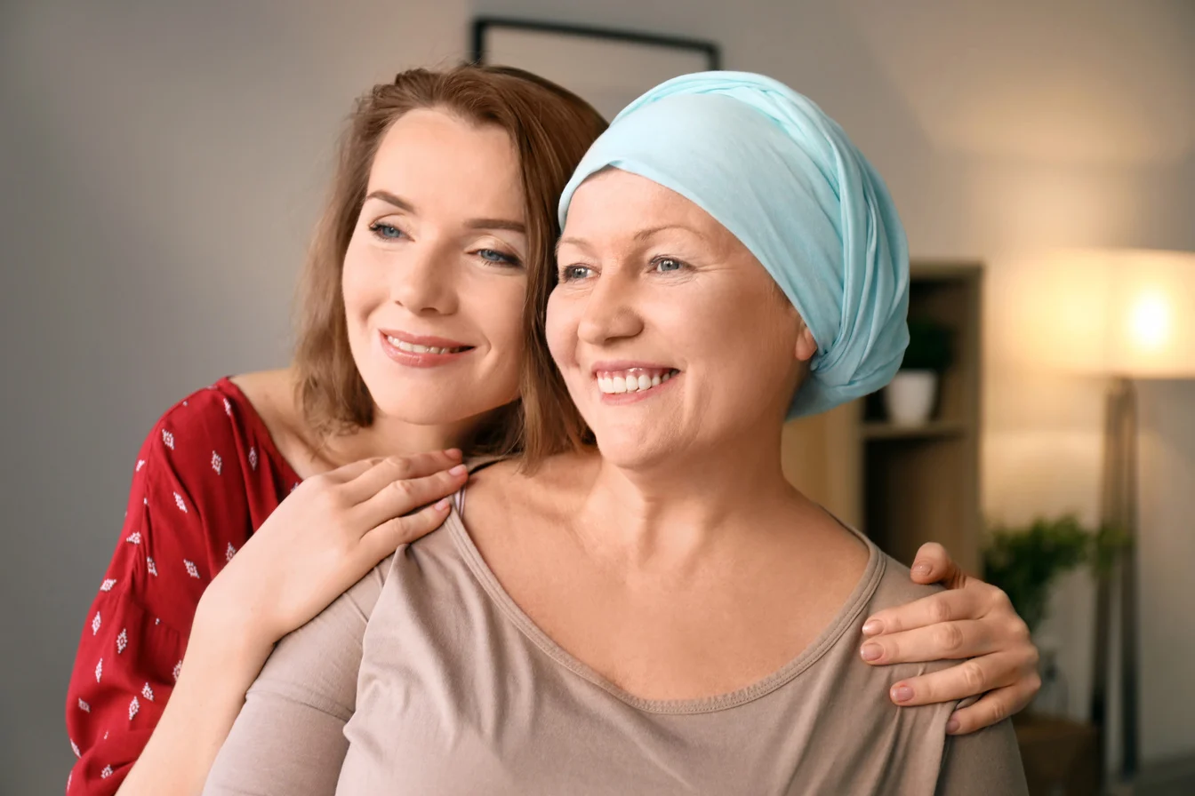 Female Visiting Her Mother with Cancer Indoors